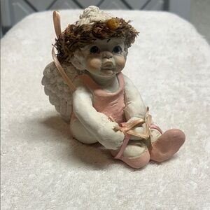 A Dreamsicles "Tiny Dancer" angel figurine with ballet attire.